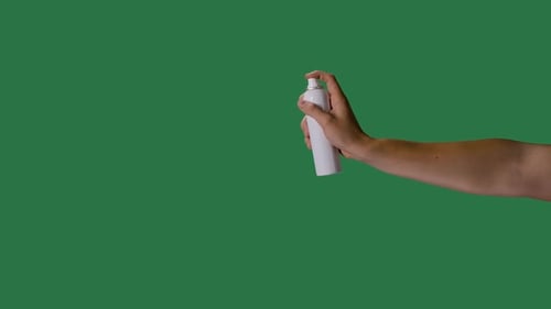 Mans Hand Sprays Disinfectant Aerosol Spray