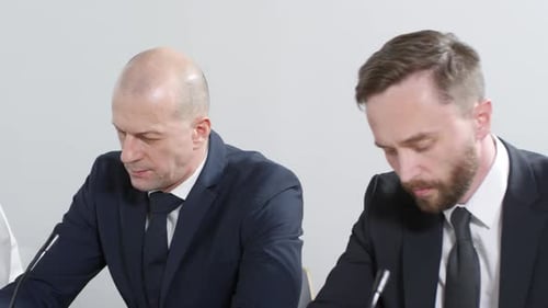 Adults at a Corporate Conference Meeting