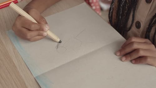 Unrecognizable Kid Drawing Person