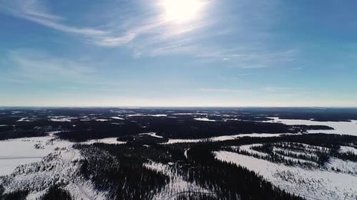 Panoramic View of the Snow Covered Forest in Winter Time From the Air