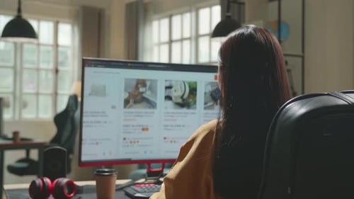 Business Woman Using Desktop Computer Shopping Online At Office