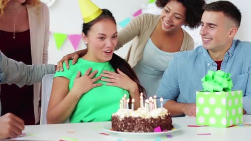 Team Greeting Colleague at Office Birthday Party 6