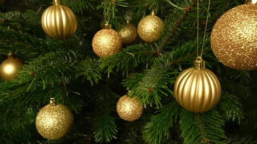 Golden Christmas Ornaments on Evergreen Tree