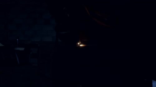 A welder fastens metal that has been fabricated