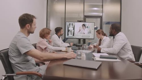 Doctors in Meeting Conferencing with Remote Colleague
