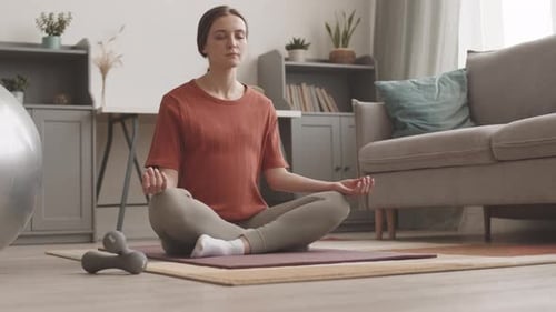 Woman Meditating at Home for Prenatal Wellness