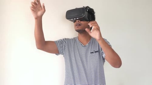 Man Using VR Headset for Immersive Experience