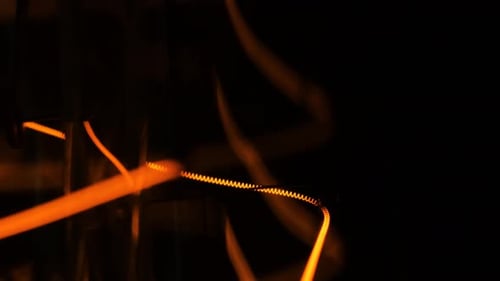 Extreme Close Up Macro Shot Footage Tungsten Old Edison Retro Lamp Turn On. Light Bulb Threads Are