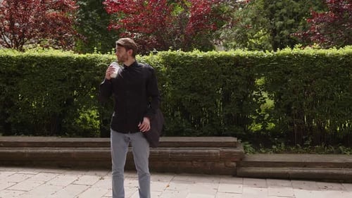 Young Adult Drinking Outside in the Daytime