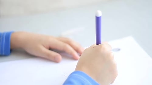 little boy at school drawing on paper stock video stock footage