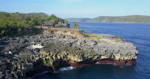 Aerial drone view of a rocky beach coastline