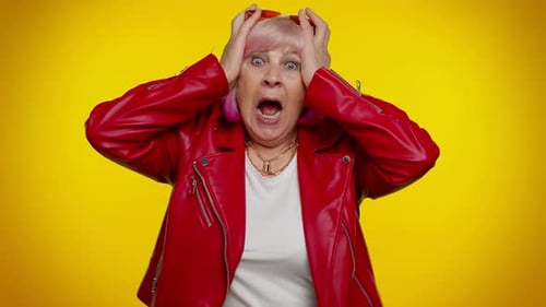 Shocked Senior Woman with Pink Hair Reacting