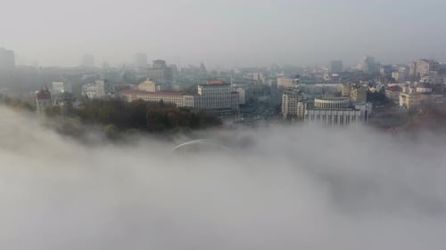 Aerial View of the City in the Fog