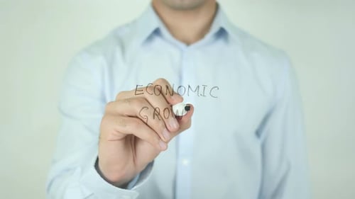 Economic Growth Being Written On A Clear Surface