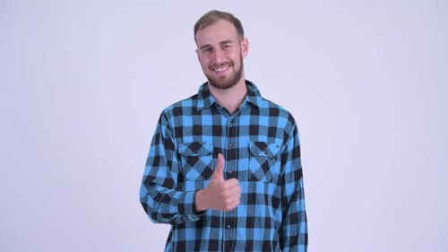Young Adult Giving Thumbs Up Gesture