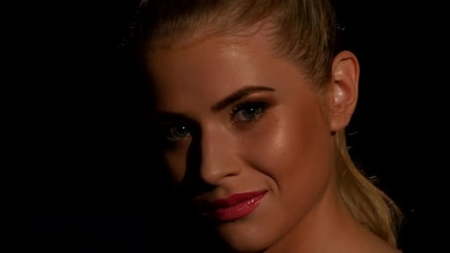 Gorgeous Woman Posing in Dramatic Lighting