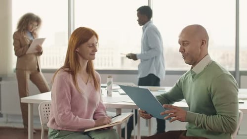 People Working In Modern Office