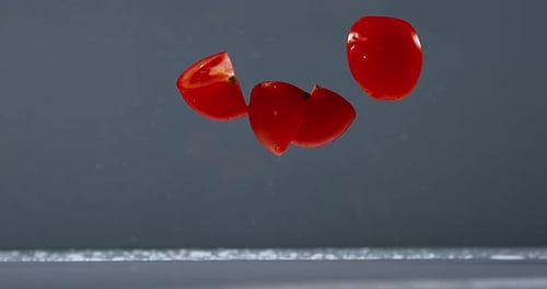 Tomatoes, solanum lycopersicum, Fruits Falling on Water, Slow Motion 4K
