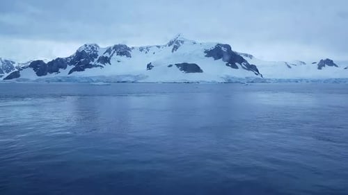 Antarctic Landscape with Sea and Mountains