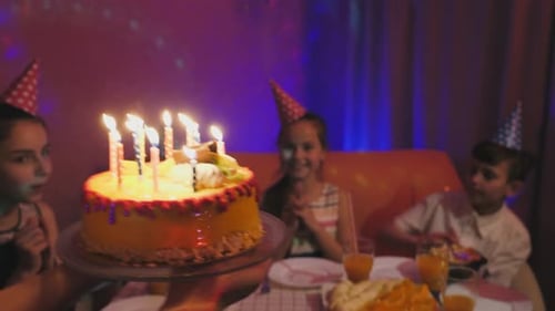 Happy Children Celebrating at a Birthday Party Indoors
