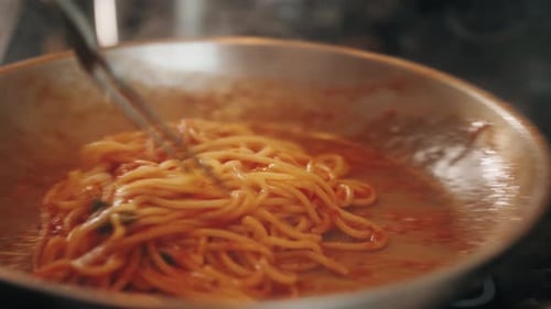 Close Up Shot Of Spaghetti Being Stirred