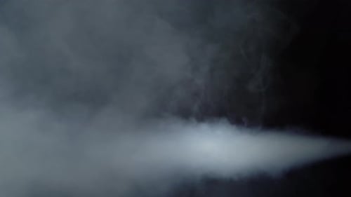 Swirling White Smoke on a Dark Background