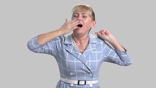 Tired Woman Yawns