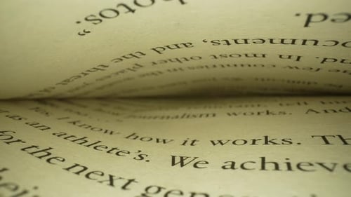 Macro Shot of Open Book with Text