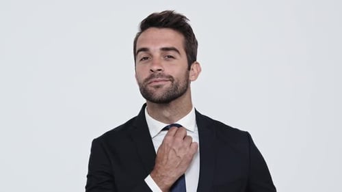 Business Guy Adjusting Tie
