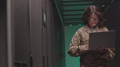 Cyber Security Worker in Server Room