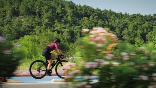 Cycling and triathlon. Woman riding bicycle