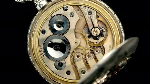 Drehmechanismus der Vintage-Uhr. Nahaufnahme. Zeitraffer. Hintergrund Hintergrund