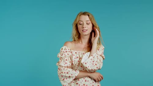 Elegant Woman Posing in Floral Dress