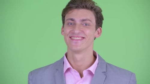 Smiling Young Adult in Suit Jacket Close Up