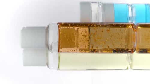 Colorful Liquids in Travel-Sized Bottles