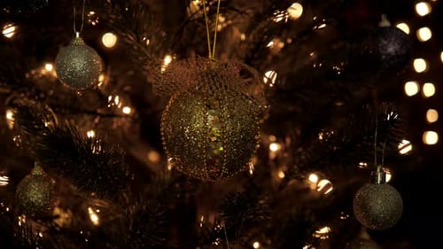 Christmas Tree Decorated with Ornaments and Warm Lights