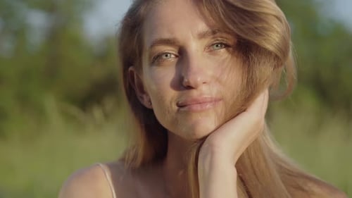 Close-up Portrait of Brunette Positive Woman Smiling at Camera. Beautiful Face of Charming Beautiful