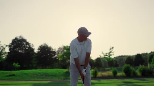 Golf Player Teeing Club Putter on Sport Training