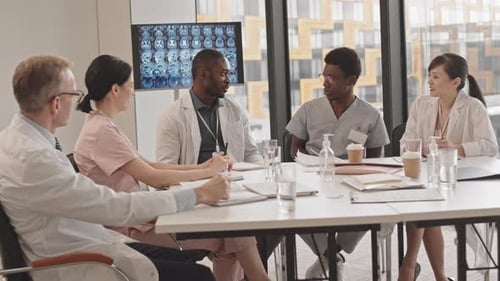 Medical Team Collaborating in Modern Office Setting