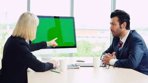 Business People in the Conference Room with Green Screen