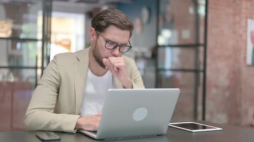 Adult Using Laptop at Modern Office Workplace