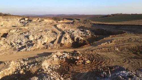Aerial View of Open Pit Mine of Sandstone Materials for Construction Industry with Excavators and