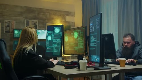 Team of coders working late at night