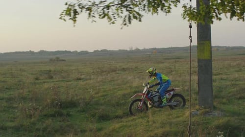 Motorcycle Jumps and Stunts in a Rural Setting