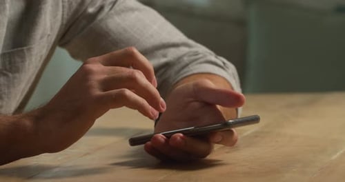 Caucasian man using his phone
