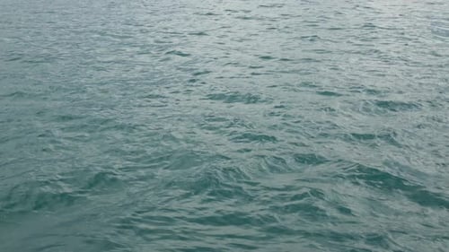 View motion dark blue waves on water