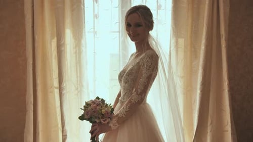 Bride Smiling Holding Her Wedding Bouquet
