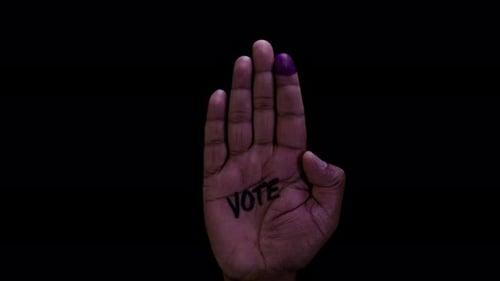 Hand Showing Support with Painted Nail for Vote