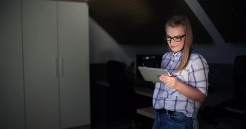Businesswoman With Coffee And Digital Tablet At Workplace