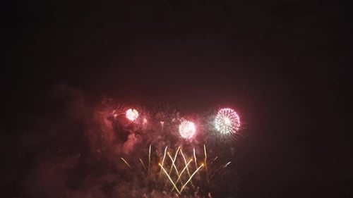 International fireworks festival display at night. Variety of colorful fireworks in holidays